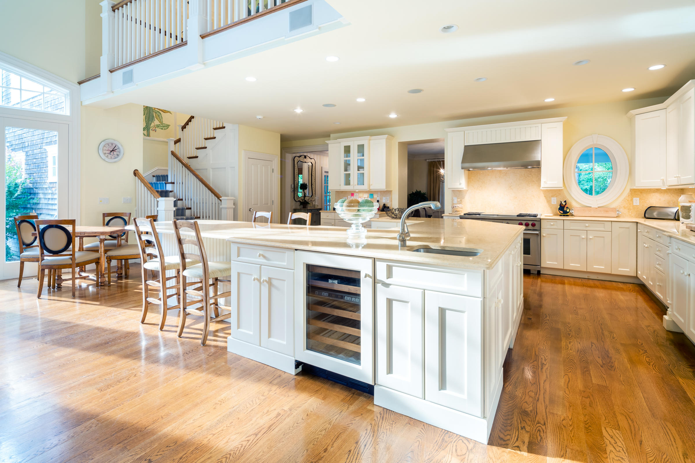 350 Windswept Way Osterville, MA 02655 - Photo 13 of 47 a open kitchen with a sink appliances and wooden floor