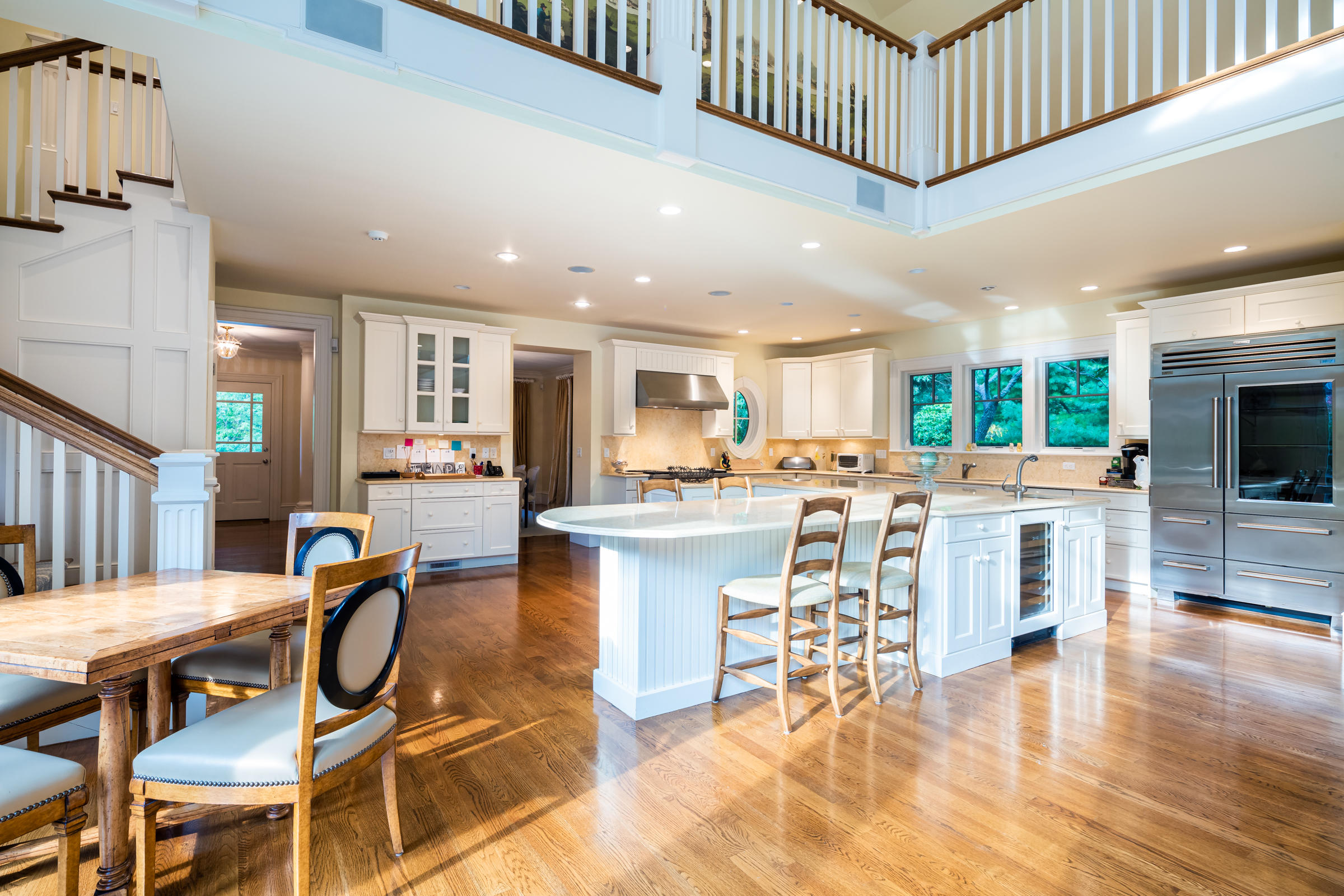 350 Windswept Way Osterville, MA 02655 - Photo 16 of 47 a living room with stainless steel appliances kitchen island granite countertop furniture and a dining table with kitchen view