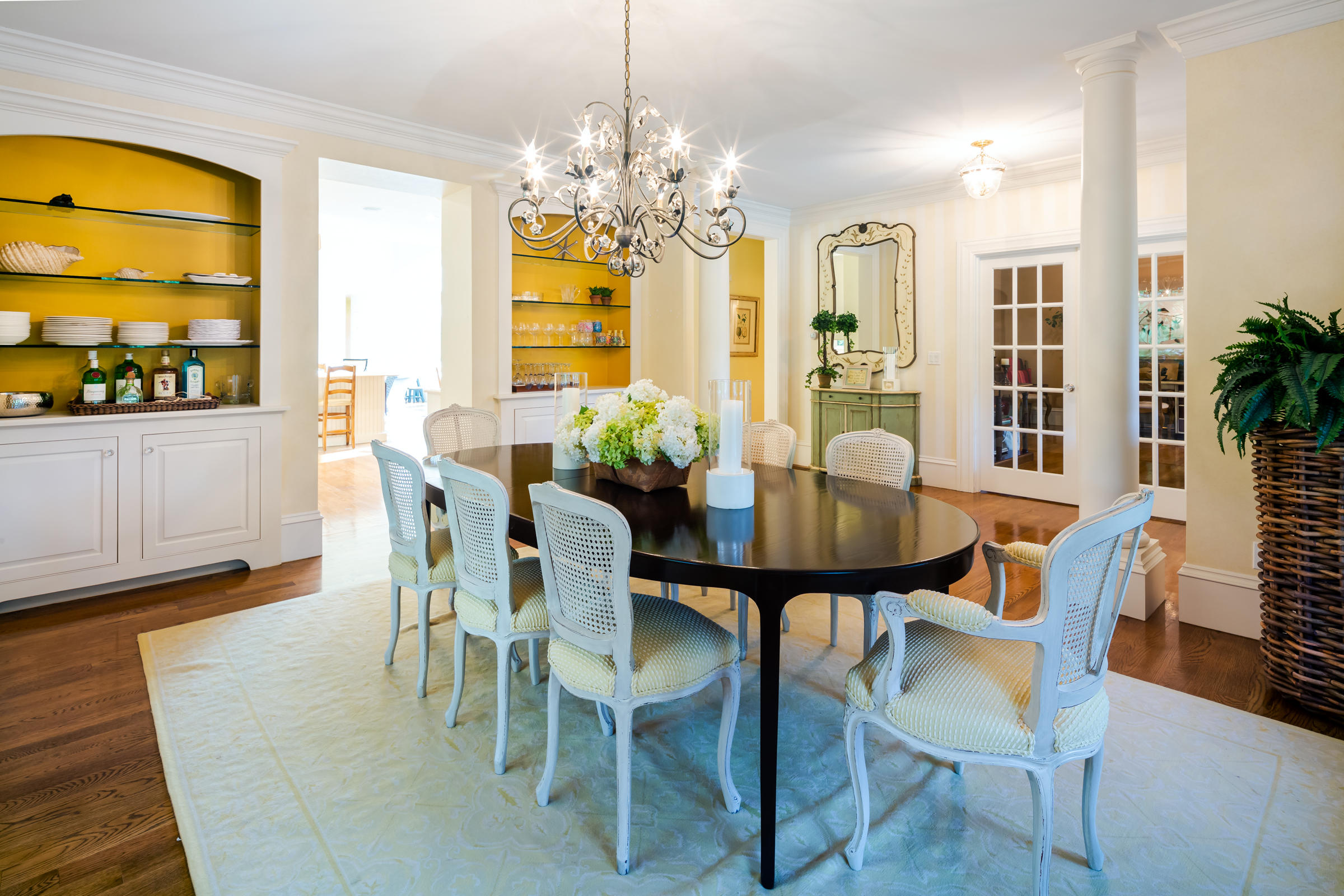 350 Windswept Way Osterville, MA 02655 - Photo 18 of 47 a view of a dining room with furniture and chandelier