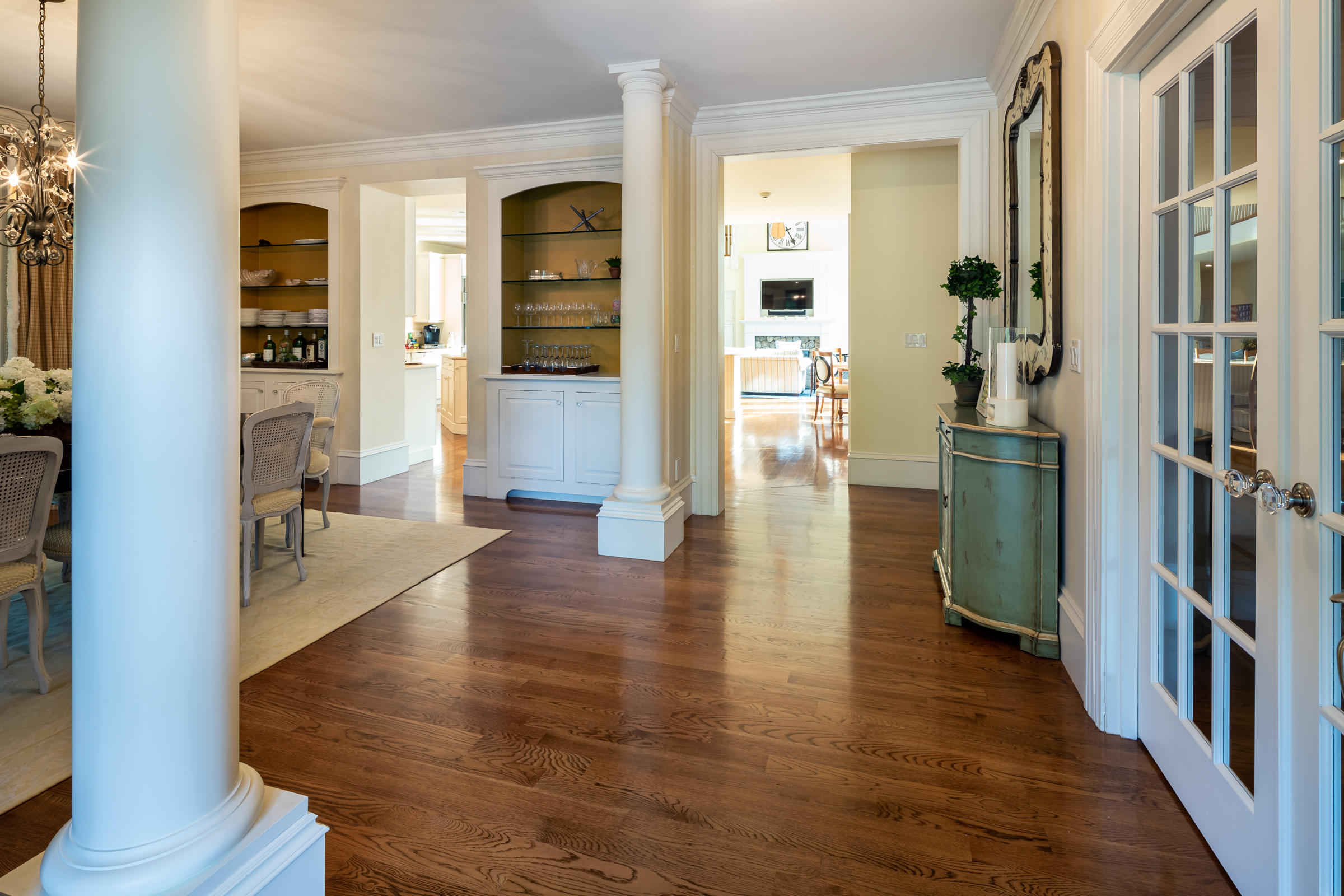 350 Windswept Way Osterville, MA 02655 - Photo 20 of 47 a view of an entryway with wooden floor and a livingroom