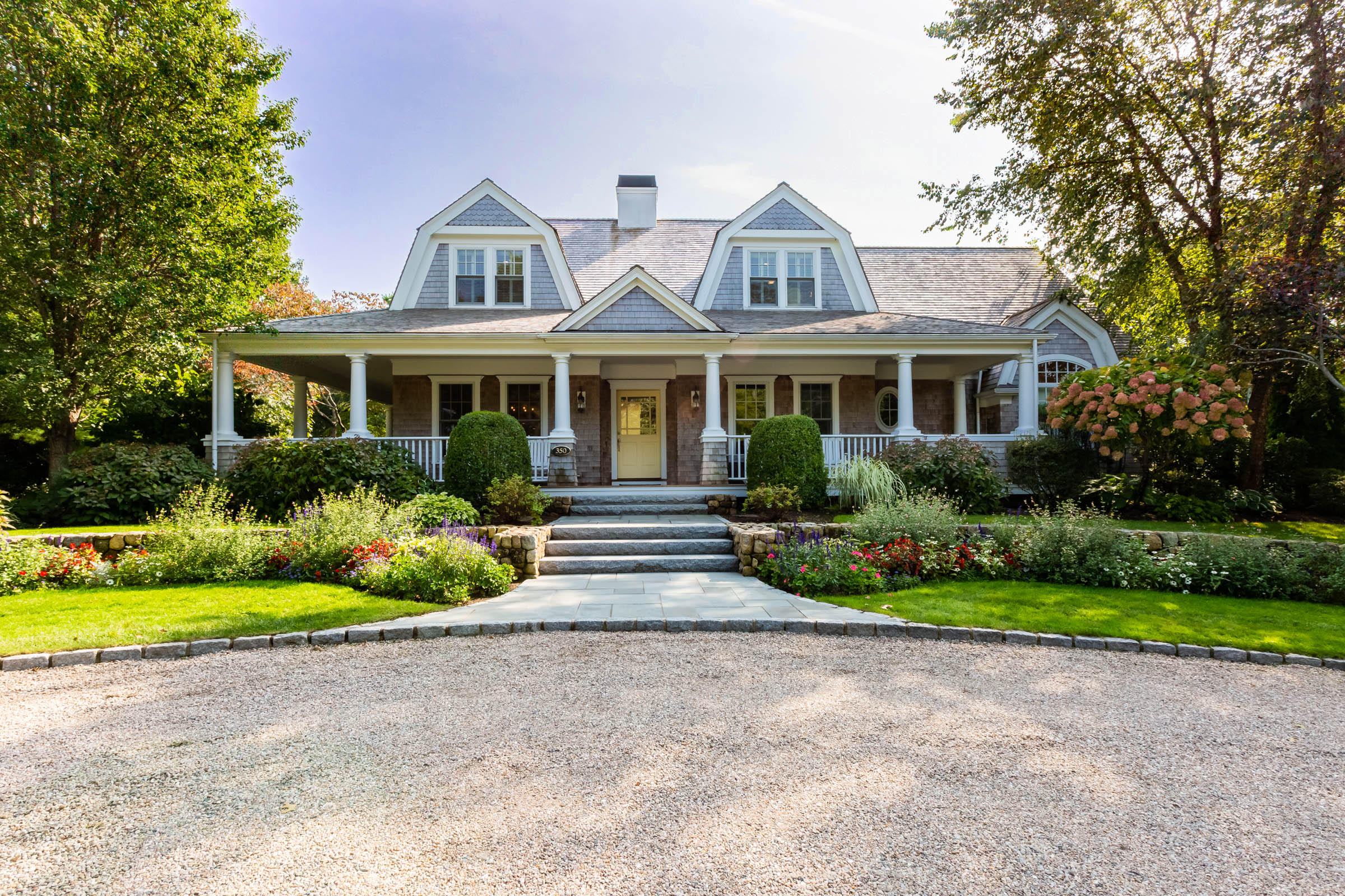350 Windswept Way Osterville, MA 02655 - Photo 2 of 47 a front view of house with yard and green space