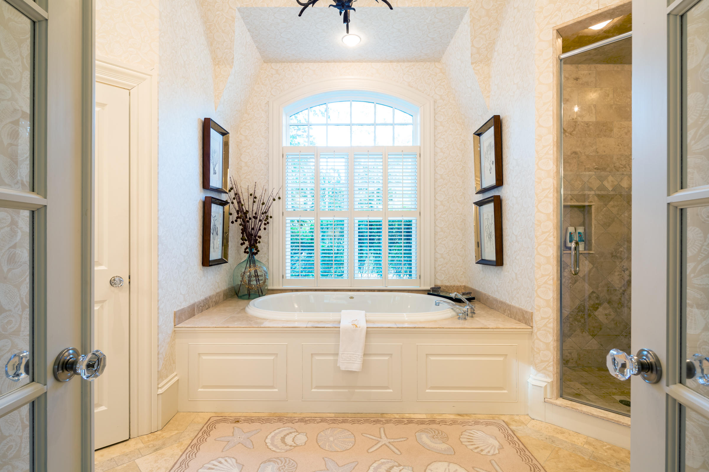 350 Windswept Way Osterville, MA 02655 - Photo 24 of 47 a view of a bathroom with a tub and a shower