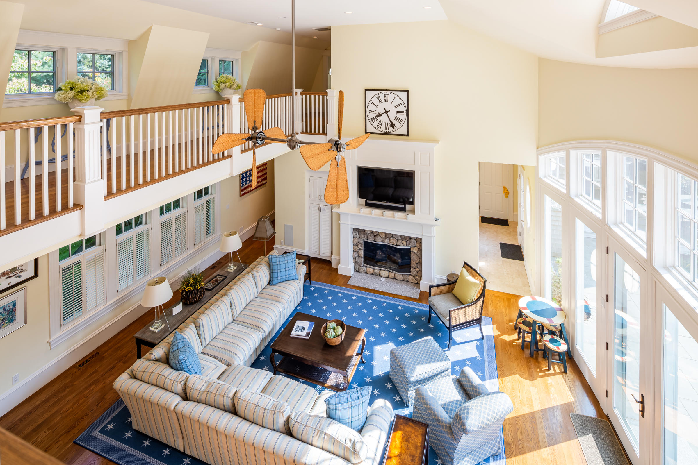 350 Windswept Way Osterville, MA 02655 - Photo 28 of 47 a living room with furniture fireplace and a table