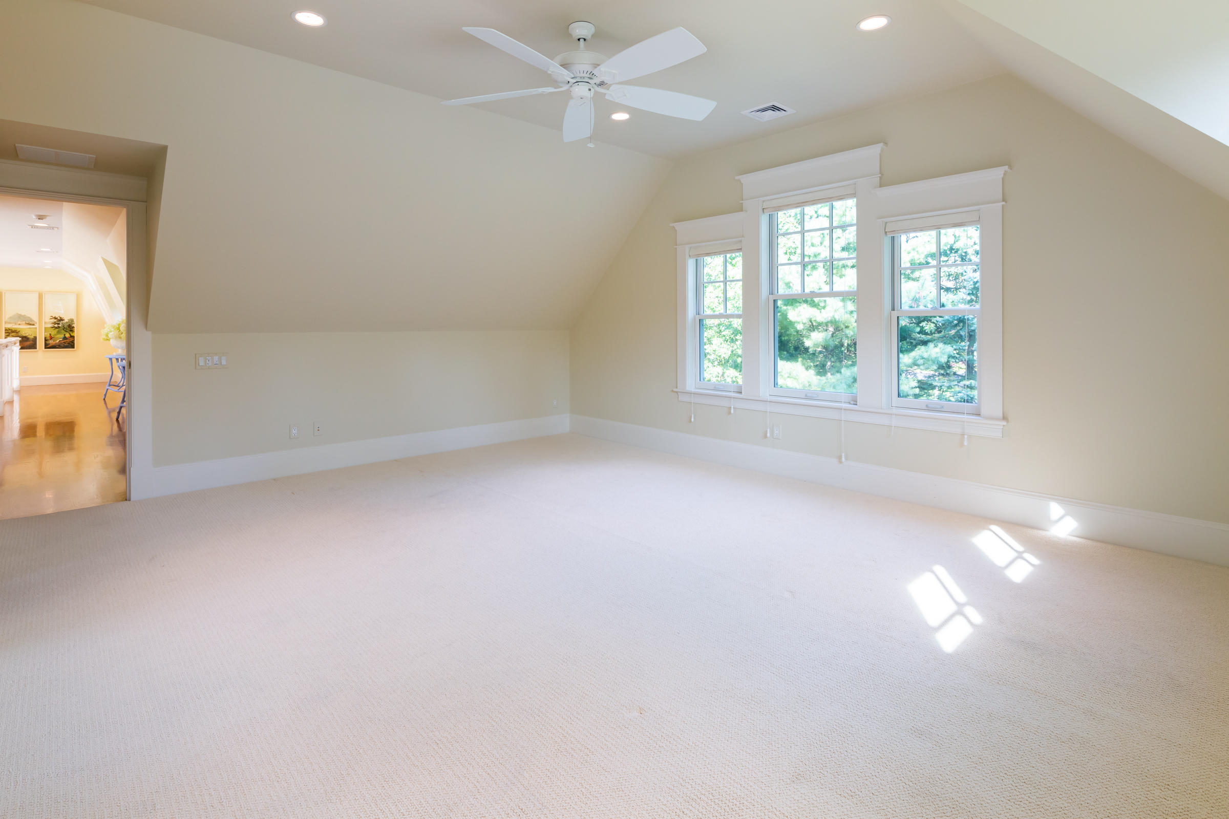 350 Windswept Way Osterville, MA 02655 - Photo 35 of 47 an empty room with windows and ceiling fan