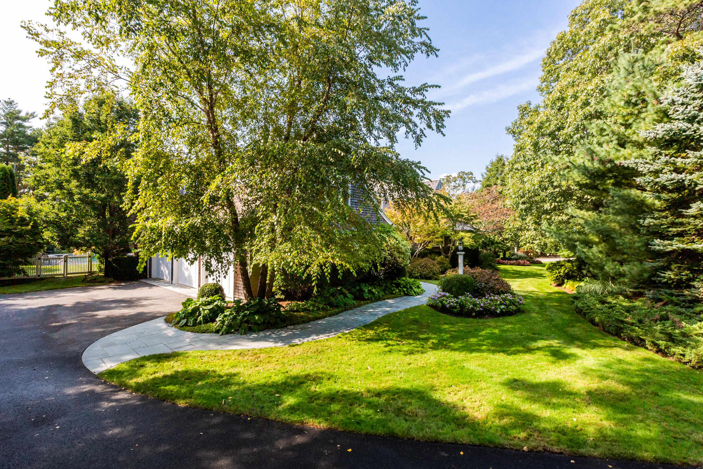 350 Windswept Way Osterville, MA 02655 - Photo 45 of 47 a view of a swimming pool with a yard