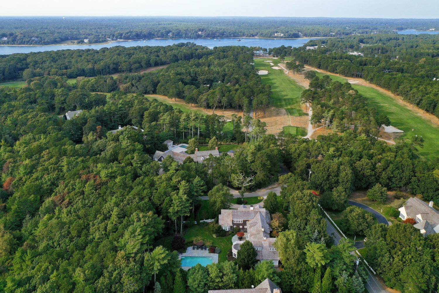 350 Windswept Way Osterville, MA 02655 - Photo 47 of 47 an aerial view of a city with lots of residential buildings