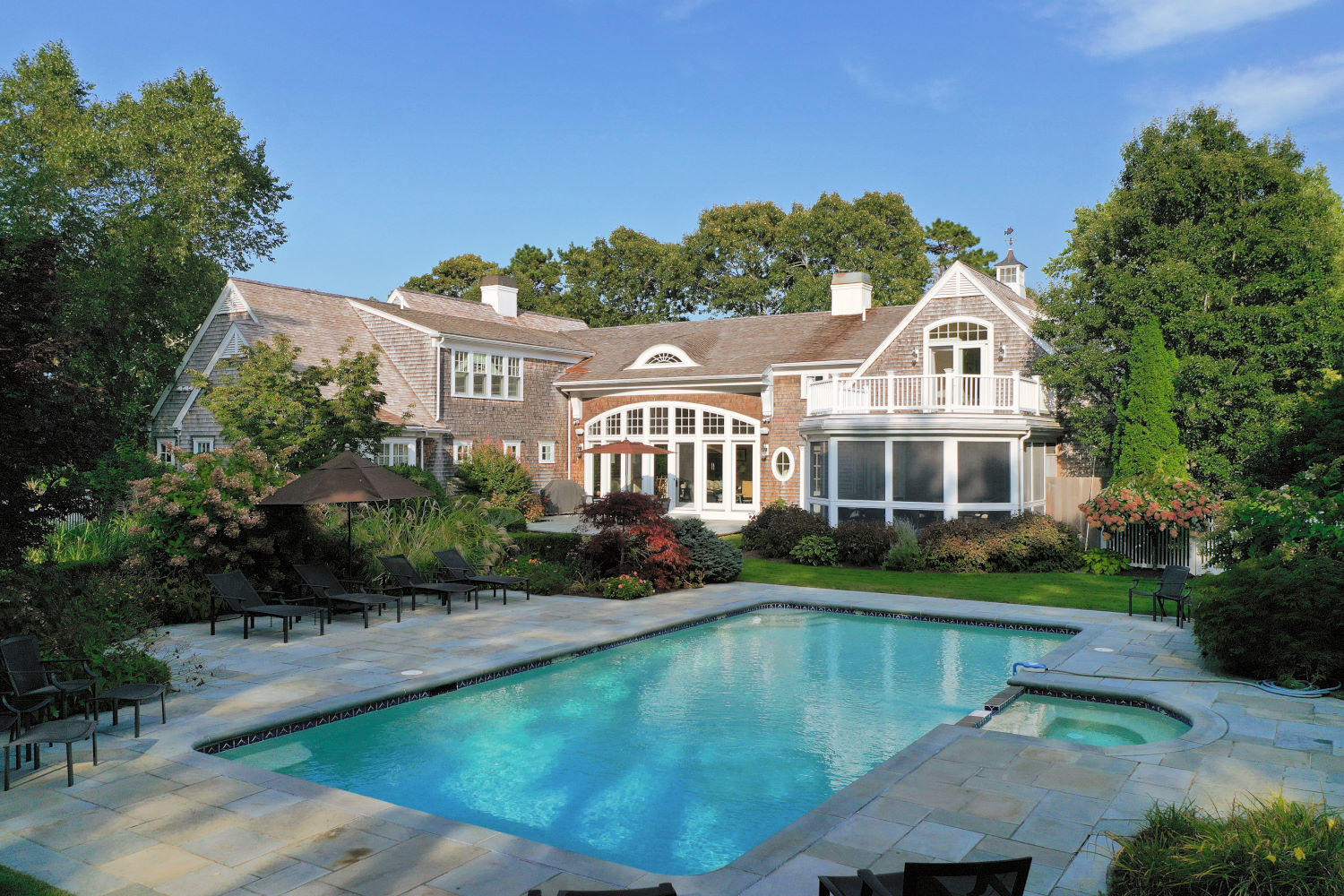 350 Windswept Way Osterville, MA 02655 - Photo 6 of 47 a view of a house with a swimming pool