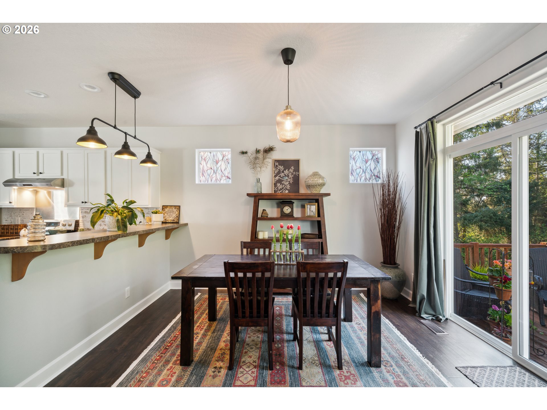4300 Sequoia Loop Netarts, OR 97141 - Photo 11 of 39 a view of a dining room with furniture window and outside view