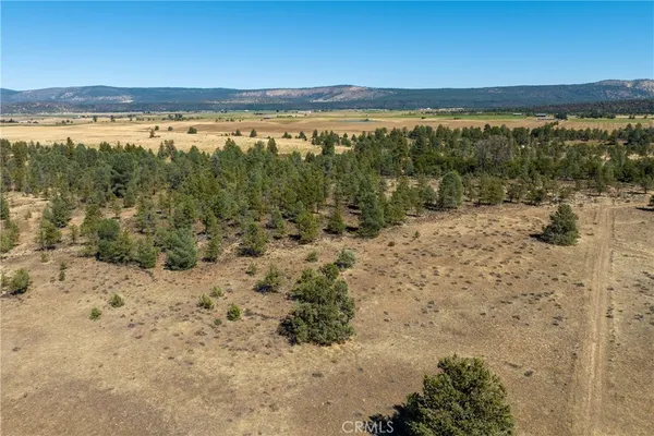 a view of a lake with mountains in the background