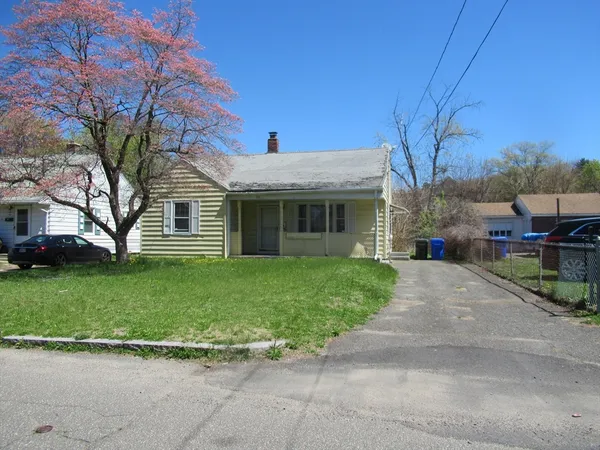 a view of a house with a garden