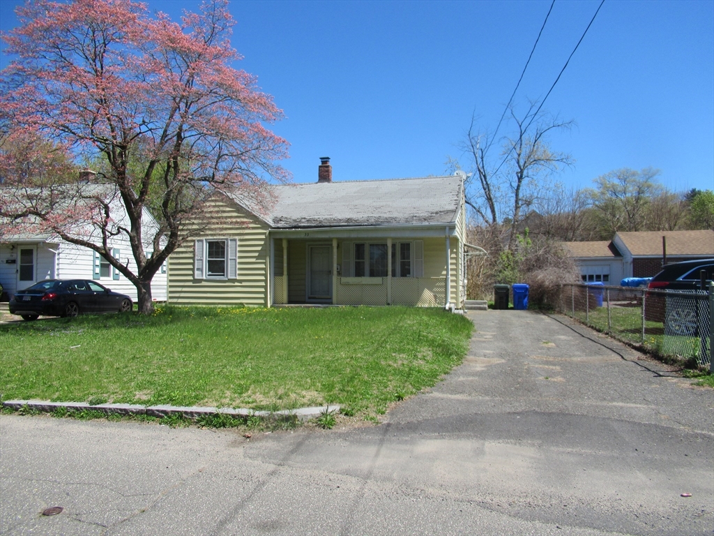 a view of a house with a garden