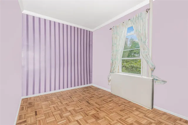 a view of a big room with windows