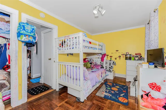 a living room with patio furniture and a floor to ceiling window