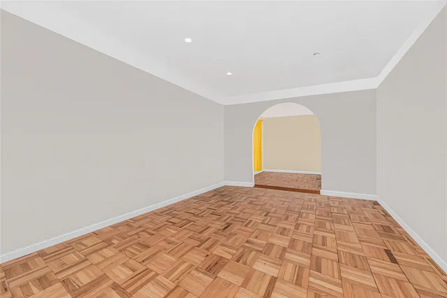 a living room with lots of baby toys and furniture