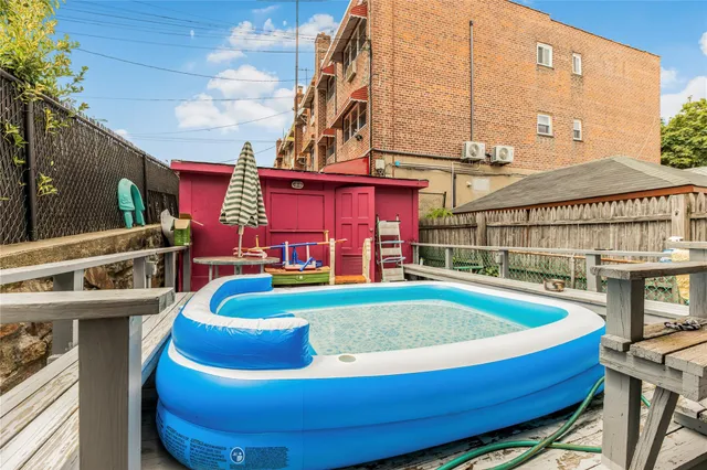 a view of outdoor space yard swimming pool and porch