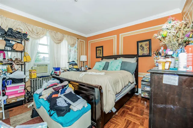 a bed room with a bed and a book shelf
