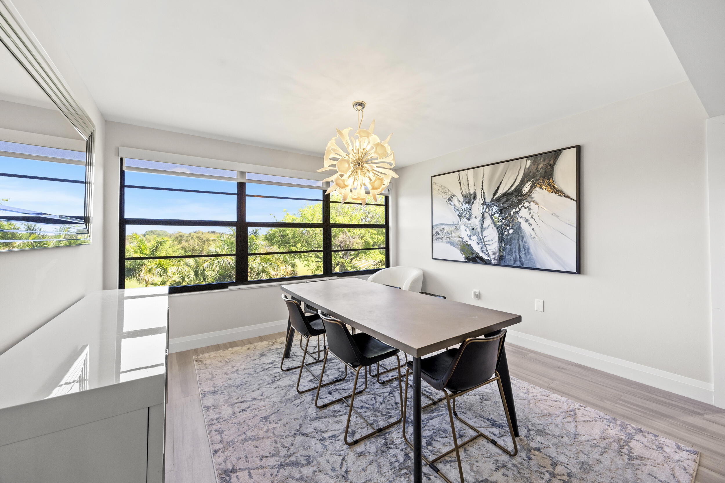 6061 Balboa Circle, Unit 403 Boca Raton, FL 33433 - Photo 20 of 44 a view of a dining room with furniture window and outside view
