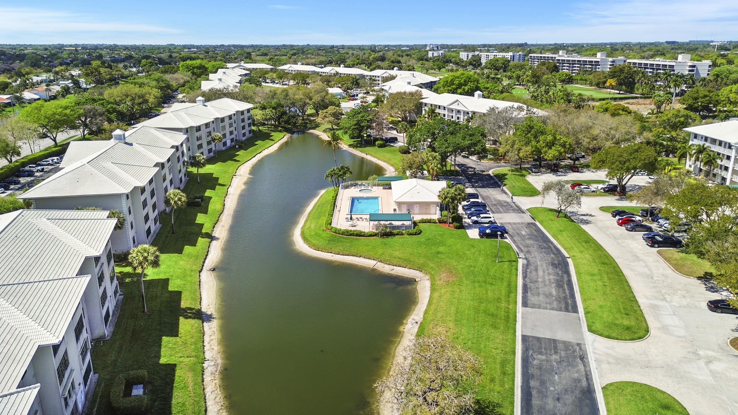 6061 Balboa Circle, Unit 403 Boca Raton, FL 33433 - Photo 41 of 44 an aerial view of a house with a swimming pool