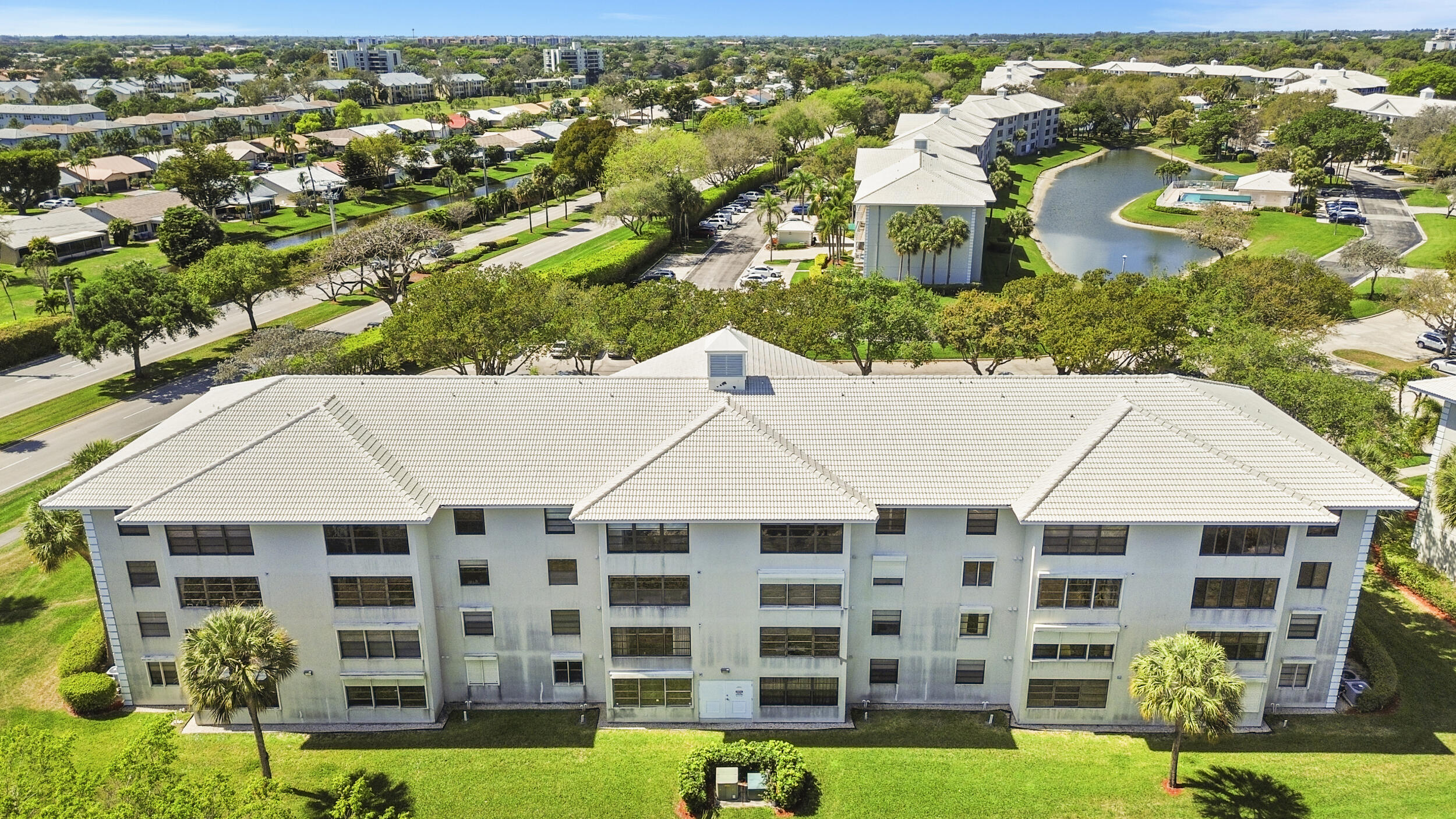 6061 Balboa Circle, Unit 403 Boca Raton, FL 33433 - Photo 42 of 44 an aerial view of multiple houses