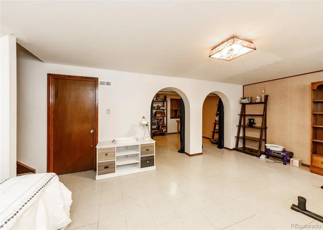 a view of livingroom with furniture and closet
