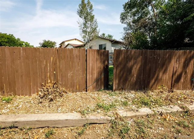 a view of a yard with an outdoor space