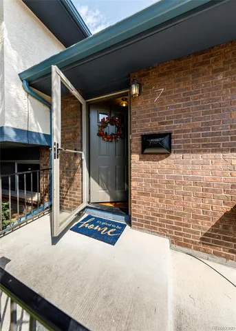 a view of entryway with window and hallway