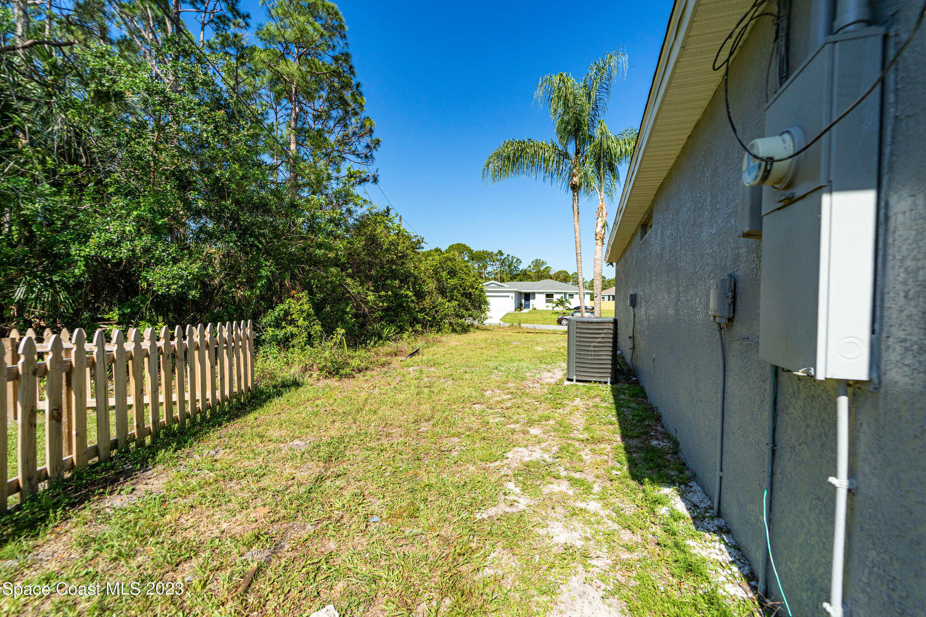 215 Trilby Road Southwest Palm Bay, FL 32908 - Photo 19 of 19 a view of a garden