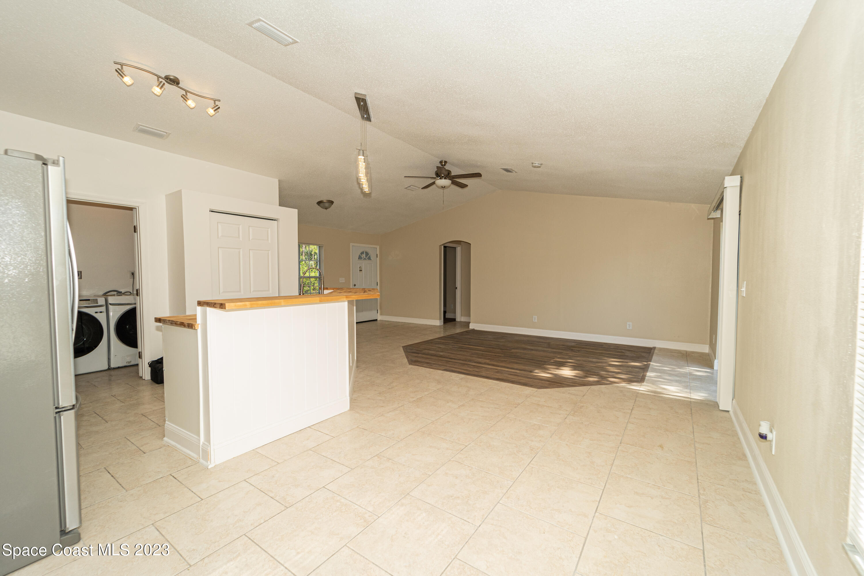 215 Trilby Road Southwest Palm Bay, FL 32908 - Photo 10 of 19 a view of a storage & utility room