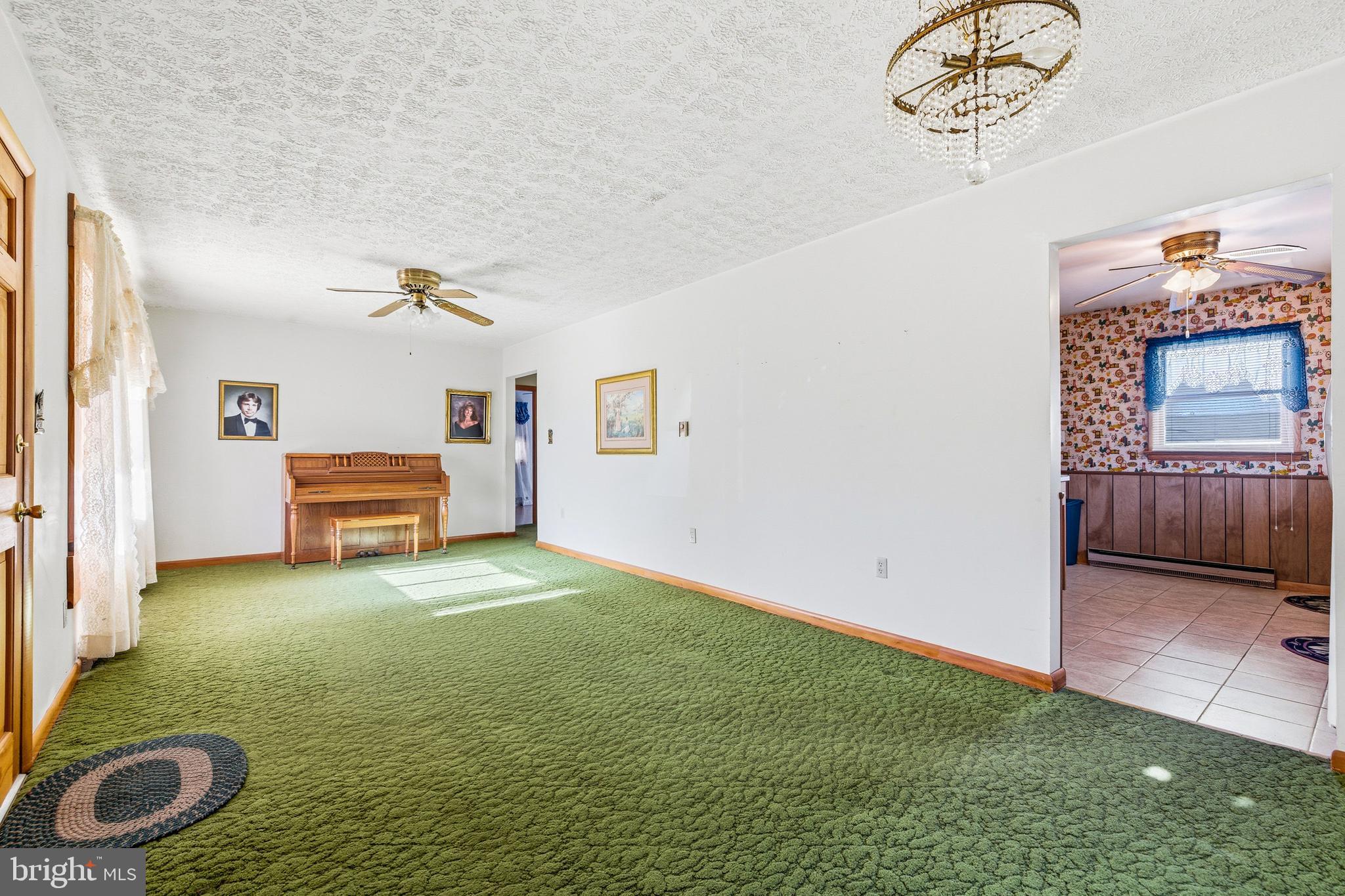 115 Sunset Drive Stanley, VA 22851 - Photo 11 of 56 a living room with furniture and a rug