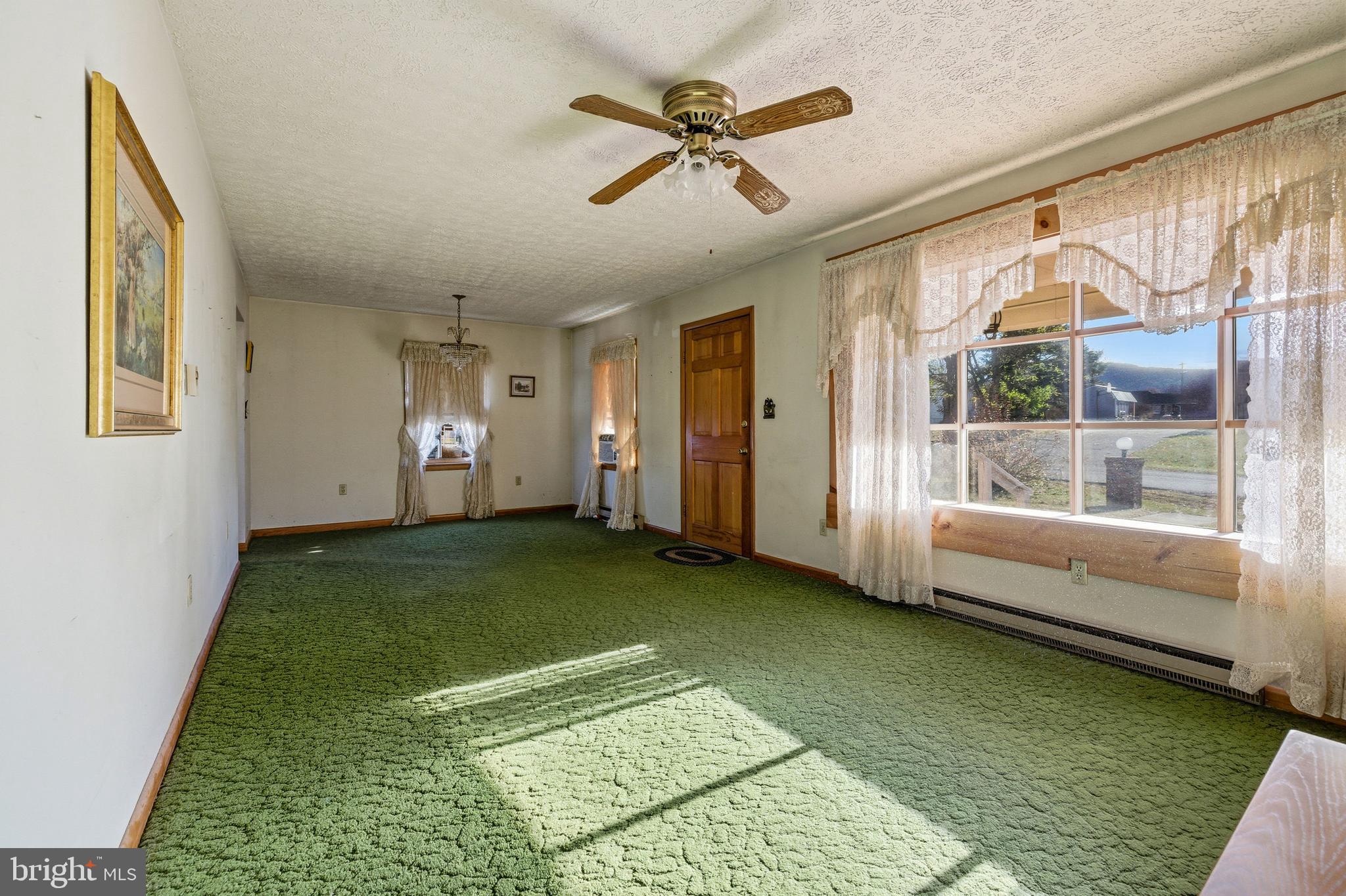 115 Sunset Drive Stanley, VA 22851 - Photo 13 of 56 a view of an empty room with a window