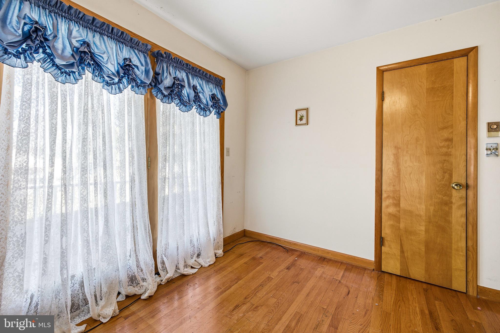 115 Sunset Drive Stanley, VA 22851 - Photo 19 of 56 a view of a room with wooden floor and a window