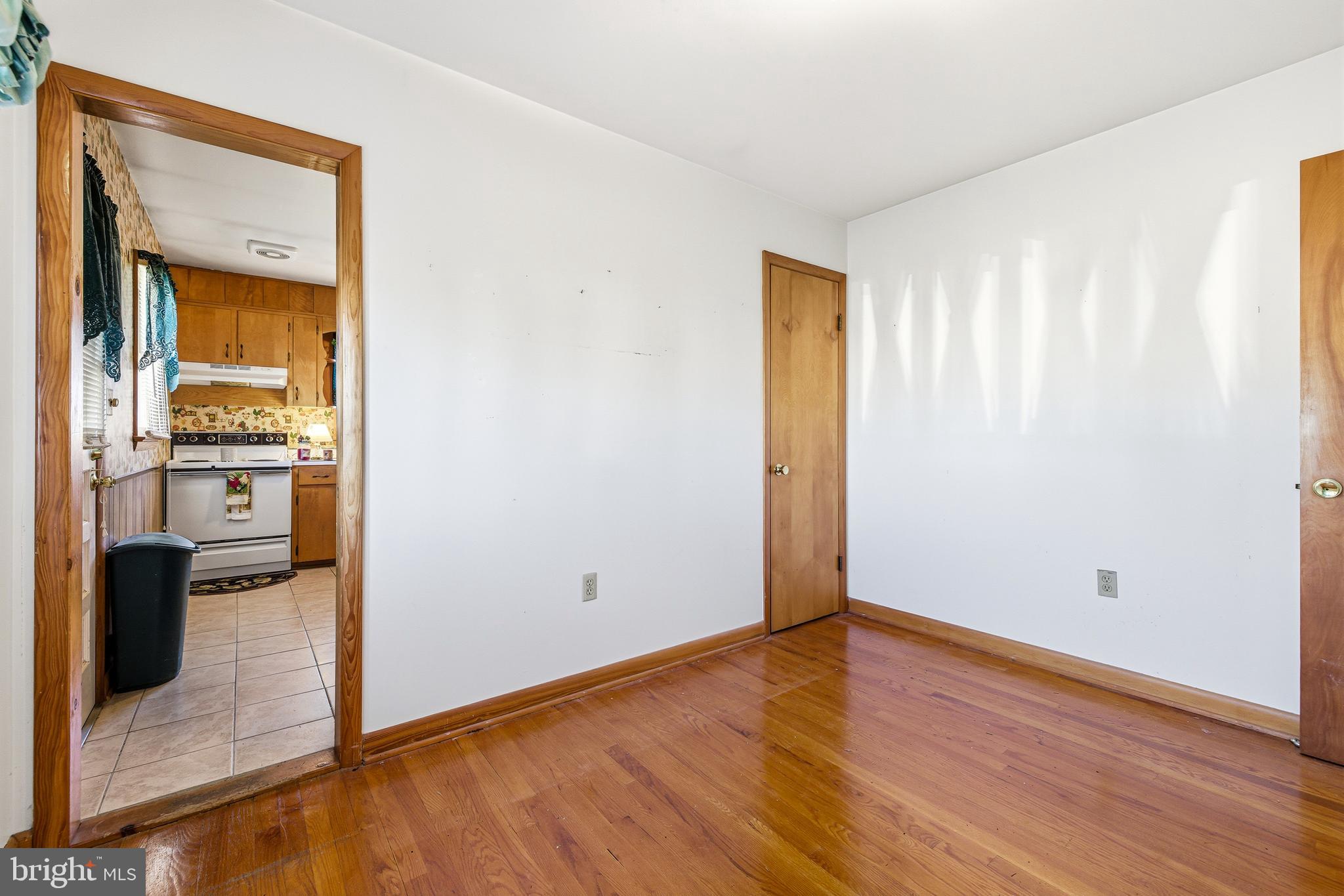 115 Sunset Drive Stanley, VA 22851 - Photo 21 of 56 a view of a hallway with wooden floor and closet area