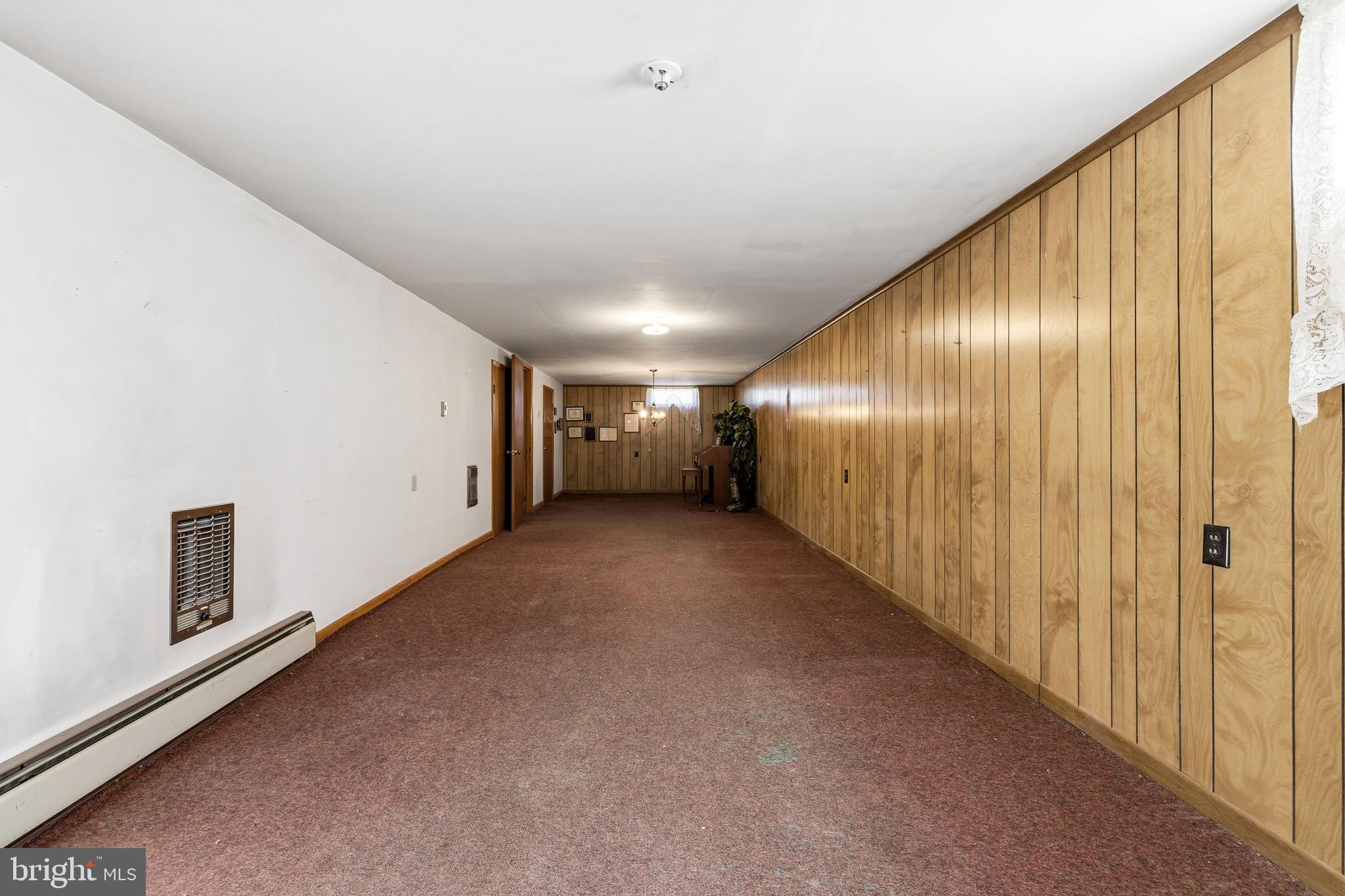 115 Sunset Drive Stanley, VA 22851 - Photo 26 of 56 a view of hallway with stairs