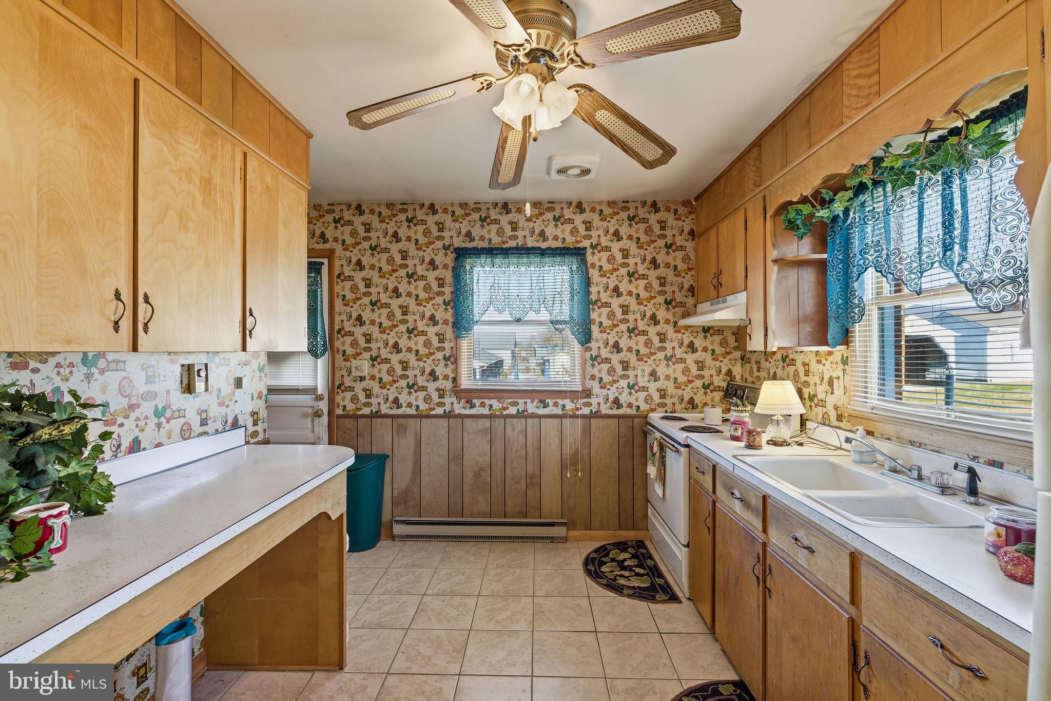 115 Sunset Drive Stanley, VA 22851 - Photo 3 of 56 a bathroom with a sink double vanity and a mirror