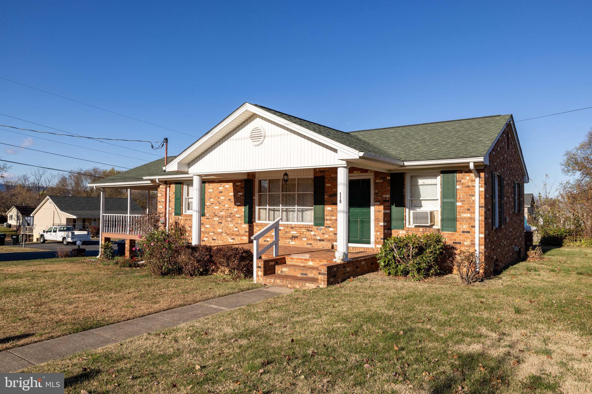 115 Sunset Drive Stanley, VA 22851 - Photo 35 of 56 a front view of a house with garden