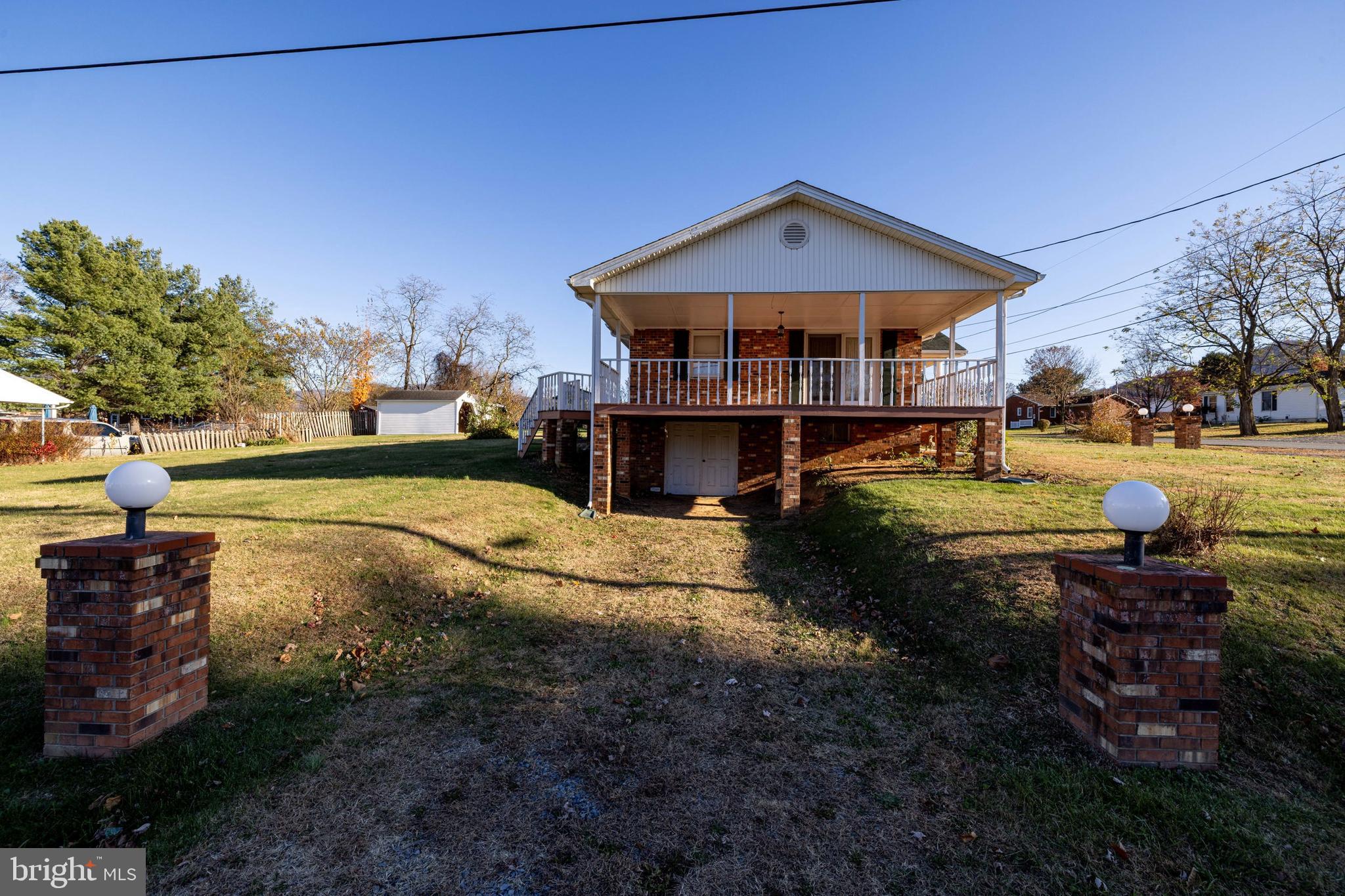 115 Sunset Drive Stanley, VA 22851 - Photo 42 of 56 a front view of a house with garden