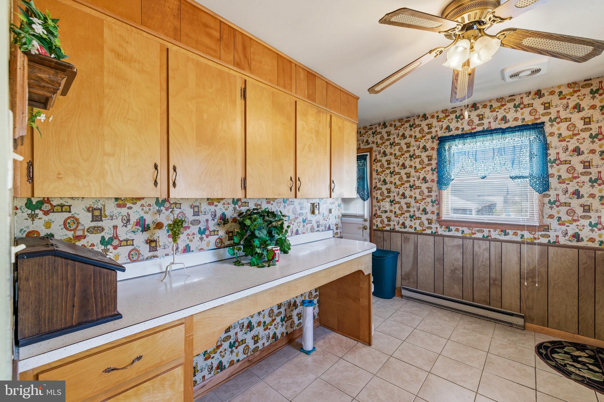 115 Sunset Drive Stanley, VA 22851 - Photo 5 of 56 a kitchen with stainless steel appliances kitchen island granite countertop a sink and cabinets