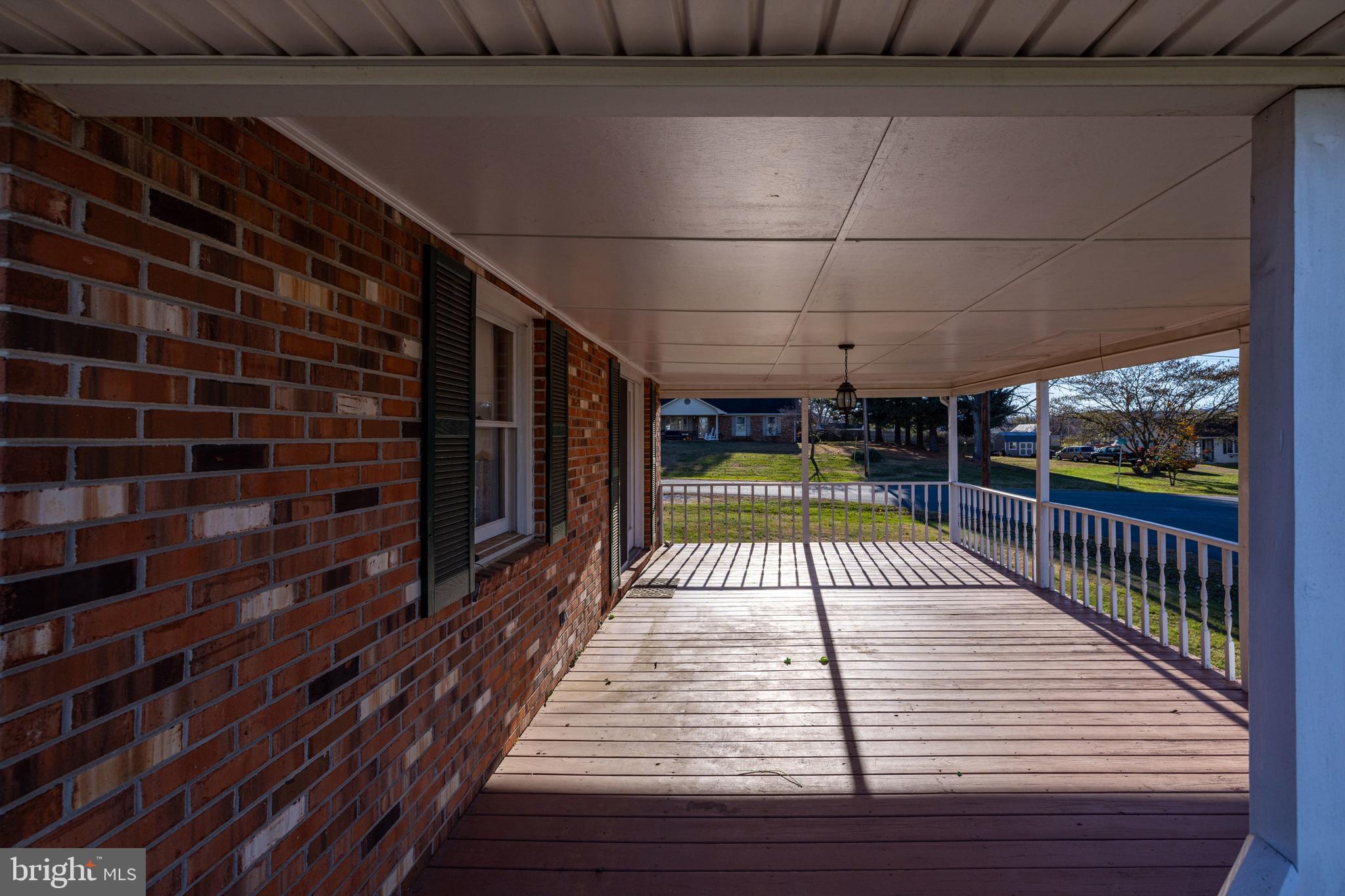115 Sunset Drive Stanley, VA 22851 - Photo 52 of 56 a view of balcony with wooden floor