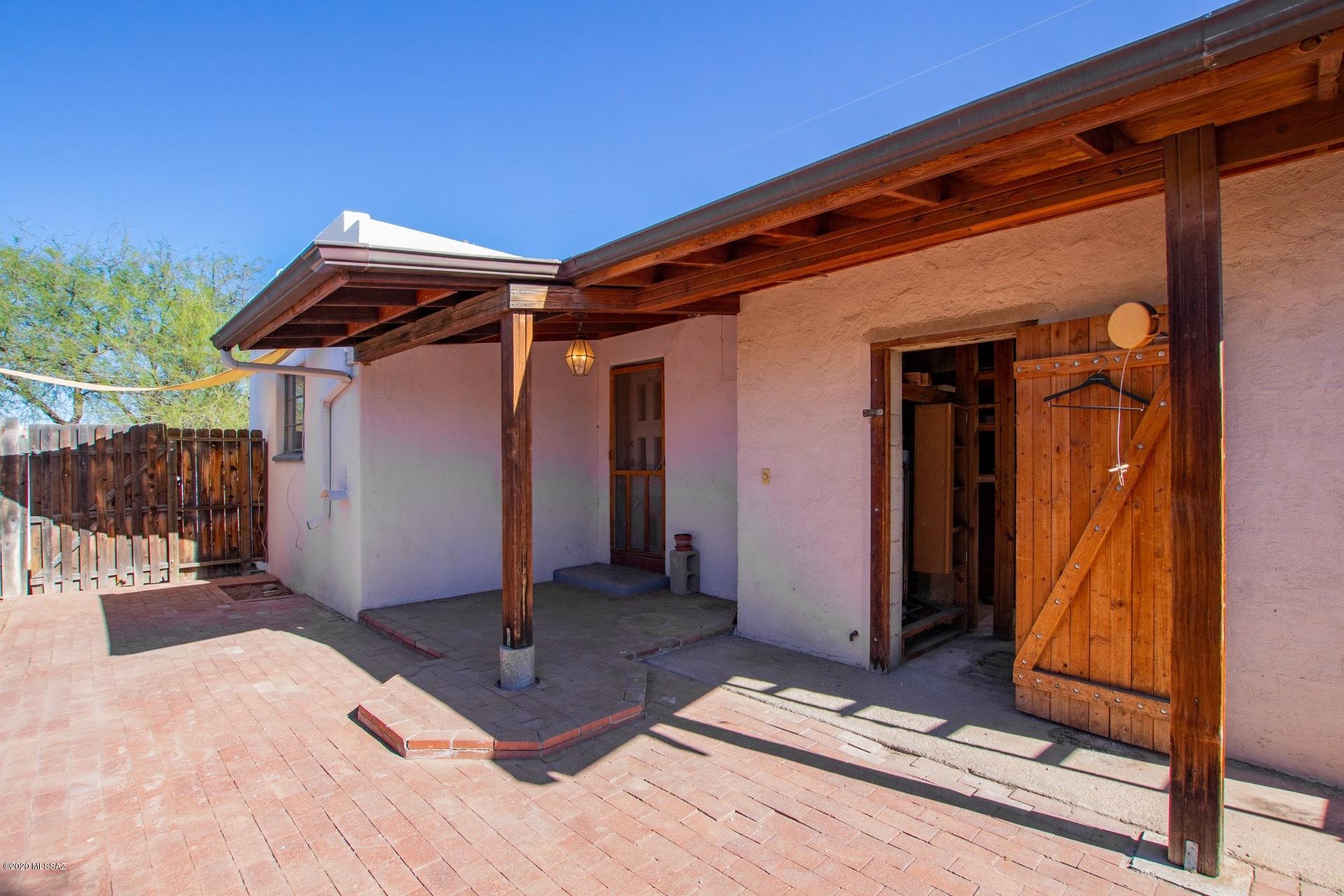 1020 East Halcyon Road Tucson, AZ 85719 - Photo 32 of 36 a view of a house with wooden walls and stairs