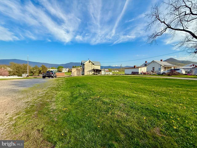 a view of lawn chairs and yard
