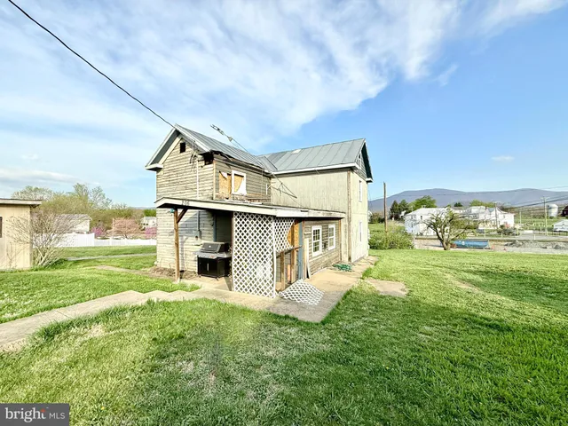 a house view with a garden space