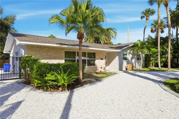 front view of a house with a small yard
