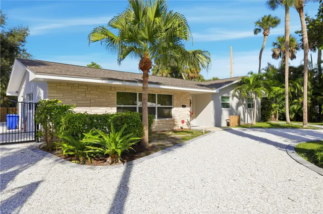 front view of a house with a small yard