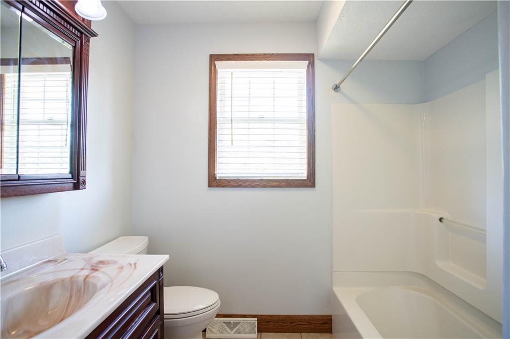 103 Mowry Road Monaca, PA 15061 - Photo 12 of 38 a bathroom with a sink toilet vanity and bathtub