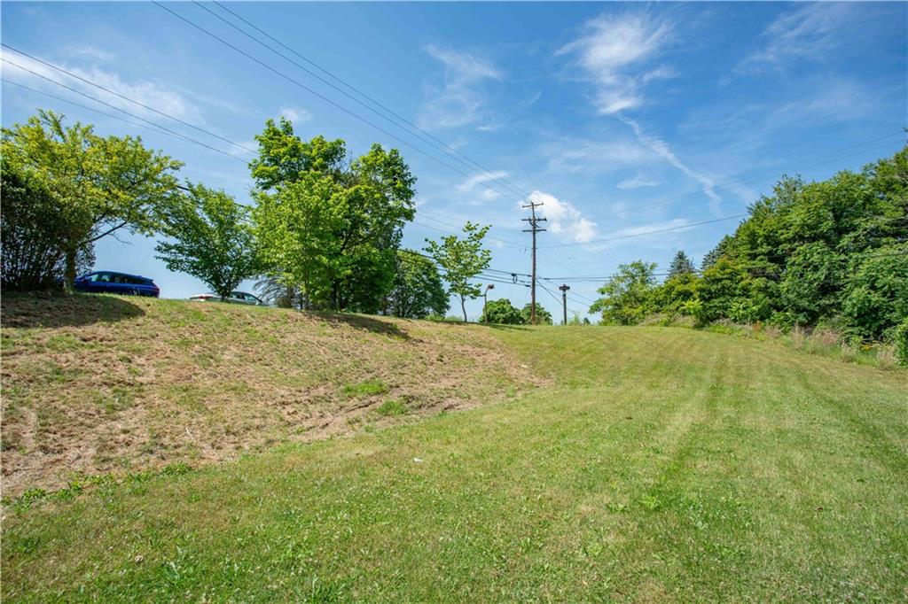 103 Mowry Road Monaca, PA 15061 - Photo 36 of 38 a view of a yard with an trees