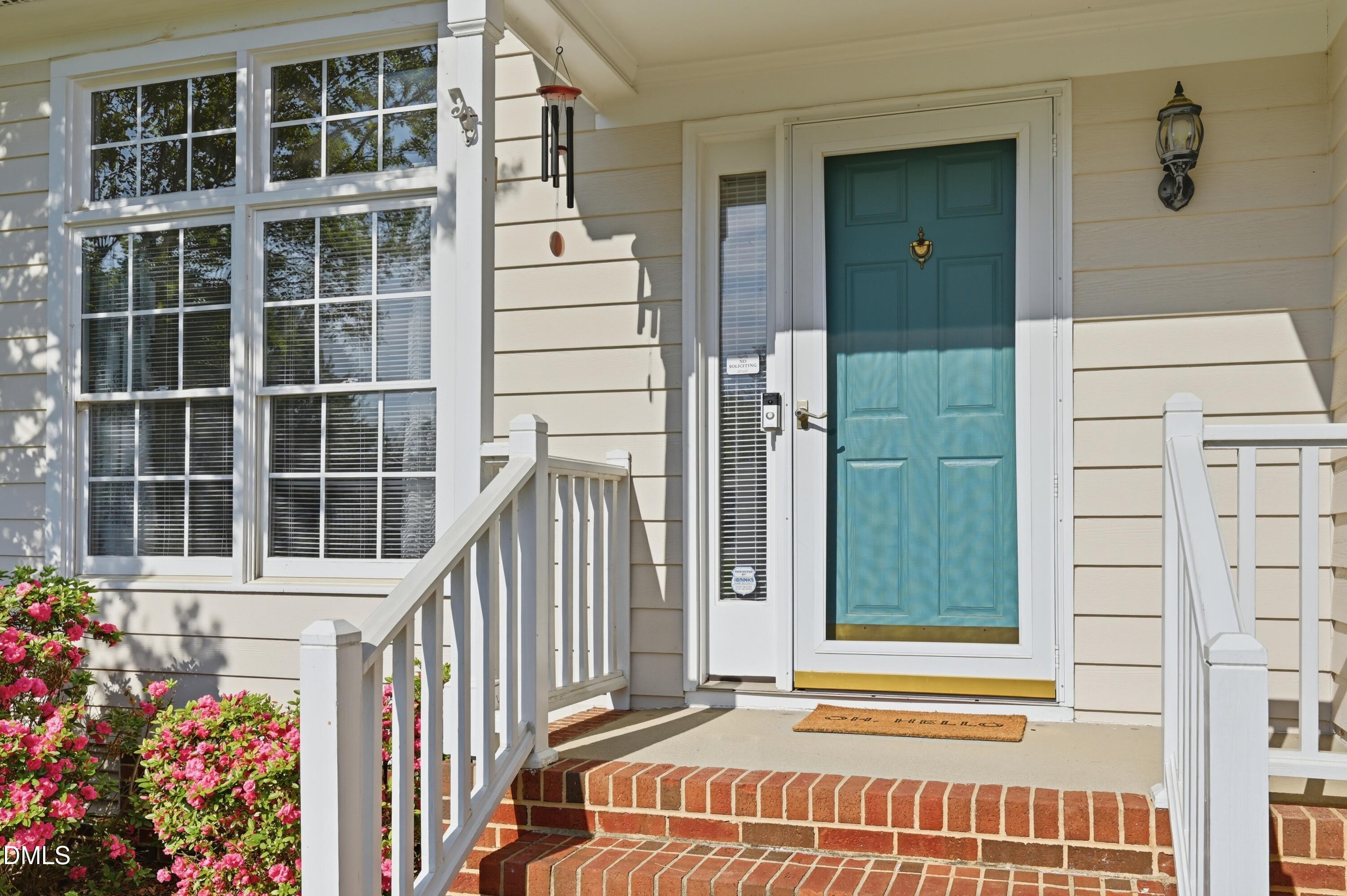 6801 Lynnoak Drive Raleigh, NC 27613 - Photo 30 of 30 a view of a house with a window and wooden floor