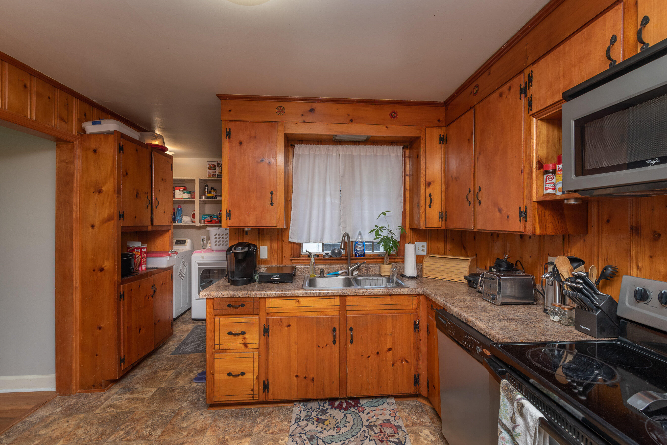114 Gyles Road Southwest Aiken, SC 29803 - Photo 14 of 35 a kitchen with stainless steel appliances granite countertop a sink stove and refrigerator