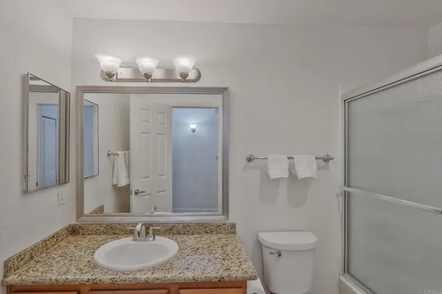 a bathroom with a sink and a toilet