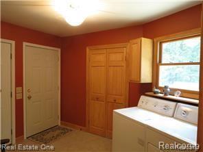 9895 Gibbs Road Clarkston, MI 48348 - Photo 56 of 75 Laundry with appliances included.