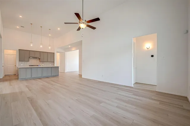 a view of a kitchen with a sink and a kitchen